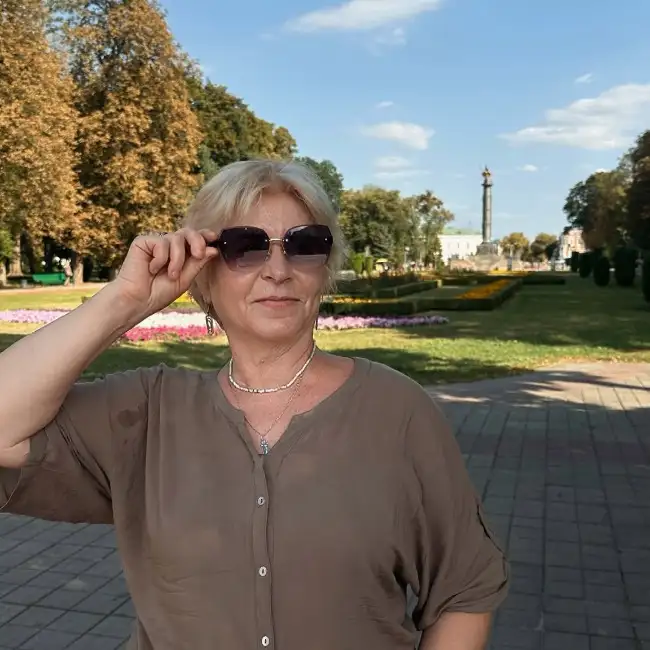 Олена, 65